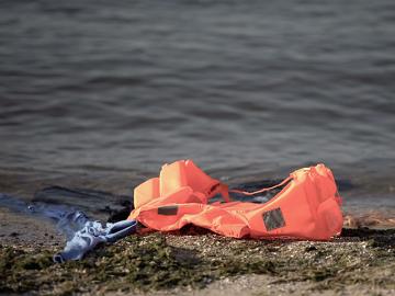 Life jacket and clothes washed up in sea