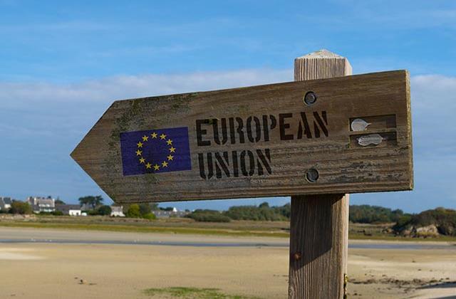 Sign pointing to the European Union