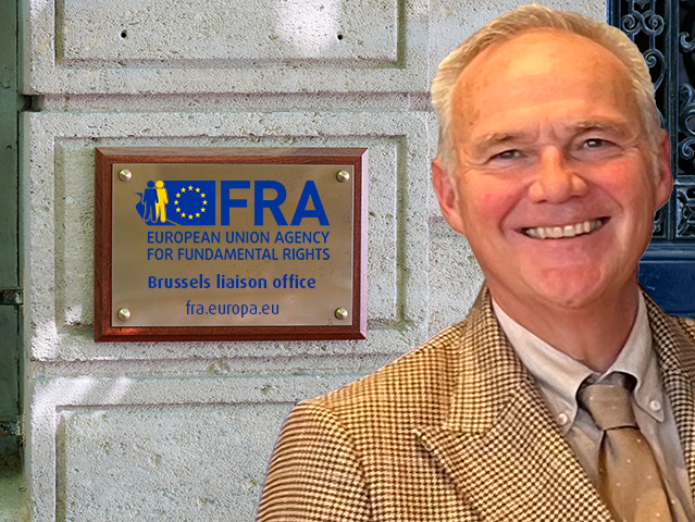 Friso Roscam Abbing outside plaque of FRA's Brussels liaison office.