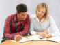 Two people working together