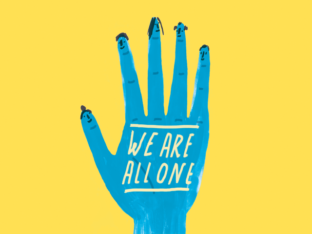 Hand with text saying we are all one.