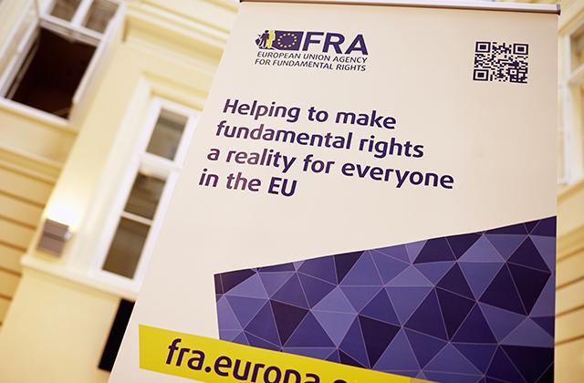 FRA rollup banner inside the premises saying Helping to make fundamental rights a reality for everyone in the EU